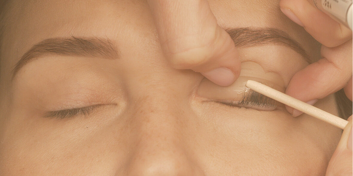 Breast Augmentation. Closeup Beautician Hands Drawing Surgical Lines On Woman Breast. Female Body With Black Marks On Breasts Before Plastic Surgery Operation